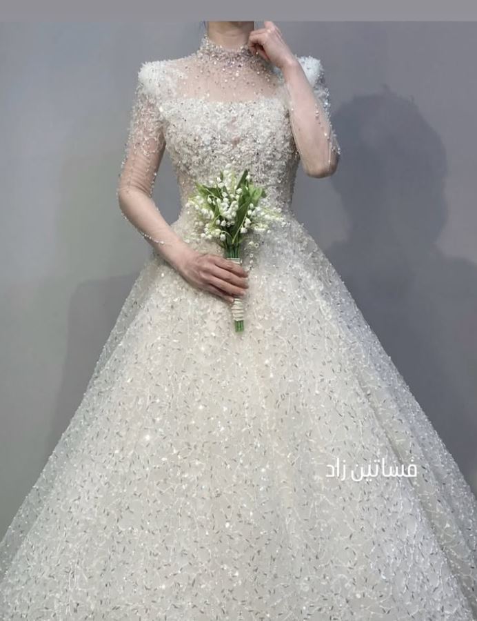 Beaded ball gown with sheer sleeves and bouquet, Zad Style