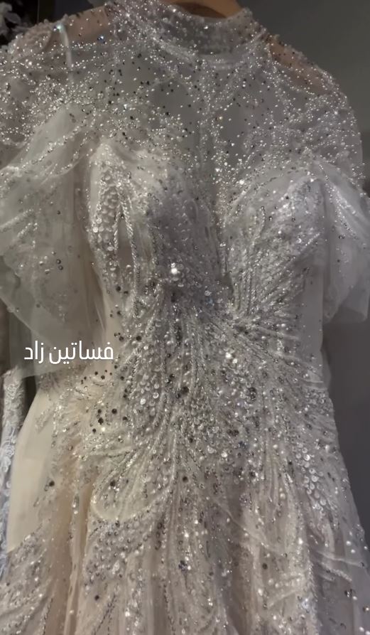 Detail of crystal-embellished sleeve and neckline, Zad Style